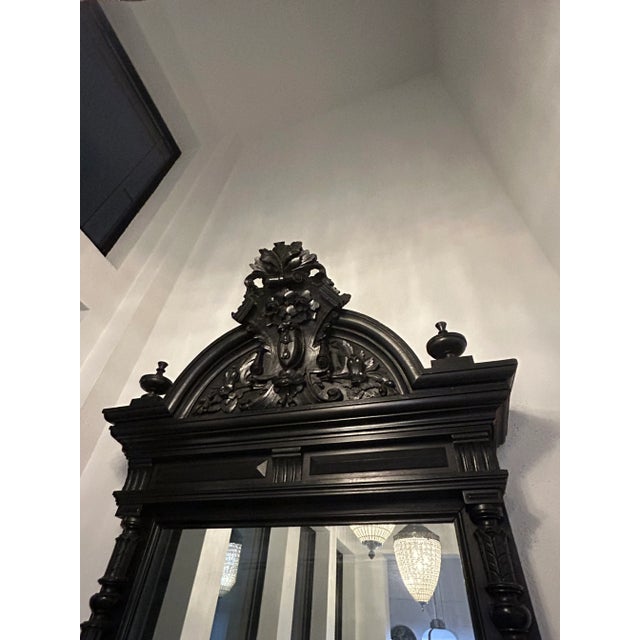 A magnificent 19th-century pier mirror with integral console, crafted in the Renaissance Revival style. Executed in...