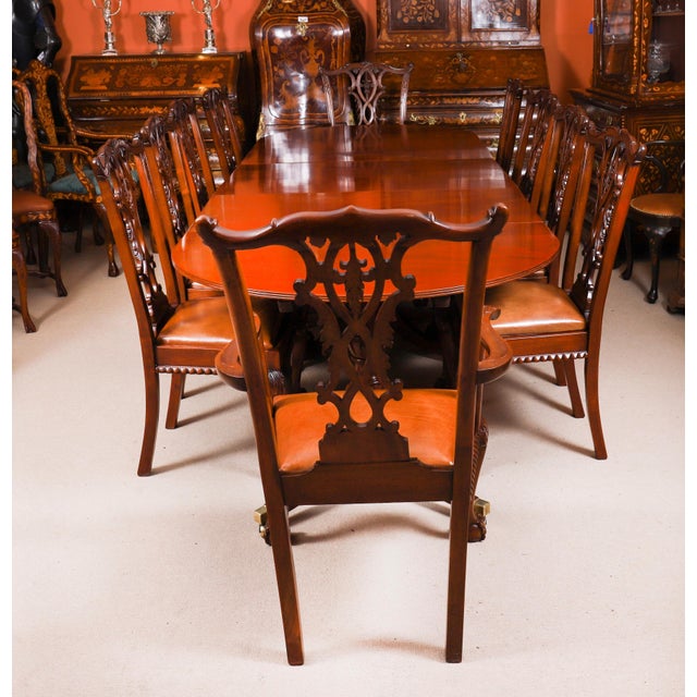 This is an elegant antique dining set that comprises an antique Regency triple pillar dining table dating from C1820 and a...