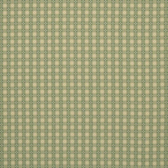 Inspired by a vintage textile from our archive, Kit Plaid is a woven small-scale check with a delightful flower detail....