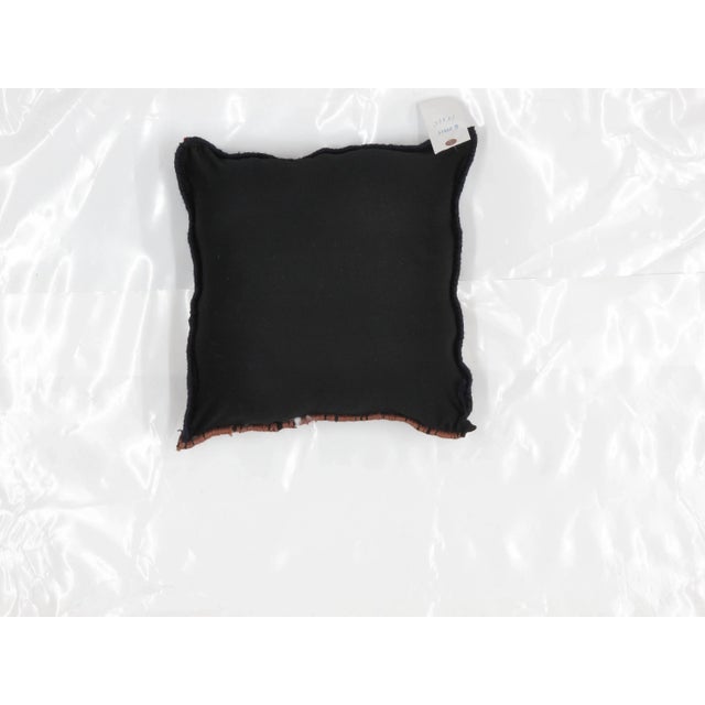 Pillow with hand made antique Persian rug fragment . Poly fill, fabric backing with sewn closure.