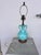 Tiffany , Turquoise ceramic body. The urn shape body reminds me of a ceramic McCoy Vase from the 1930s. The detailed base...
