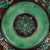 A 19th century English George Jones Majolica glazed ceramic plate with grapevine pattern in green and brown, center...
