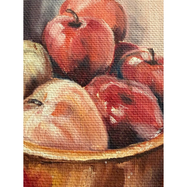 Original still life featuring richly colored fruit in a golden bowl. Warm tones and visible brushwork give this small...