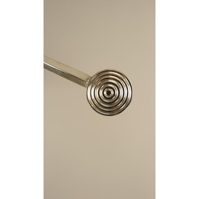 Floor lamp made of solid brass, chrome-plated. Extendable from 160 to 180 cm. The mouth-blown opal glass shade provides a...