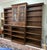 This monumental custom-built mahogany bookcase is an open-air contemporary shelving system thoughtfully constructed around...