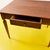 Discover the essence of timeless design with this wooden table, perfect for any space. Its simple, clean lines easily...