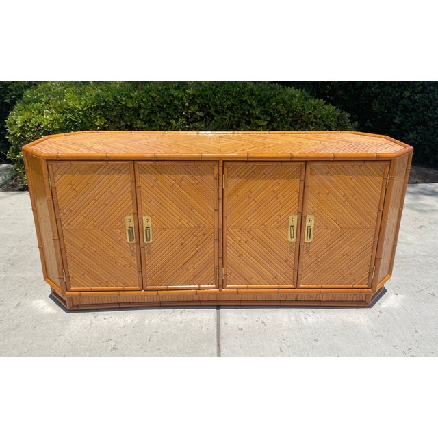 Gorgeous 70s chic credenza! This awesome vintage piece has a variety of uses and its eye-catching, organic modern design...