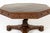 Large 19th century english oak drum table a large octagonal 19th century english oak drum table. this table top has a...