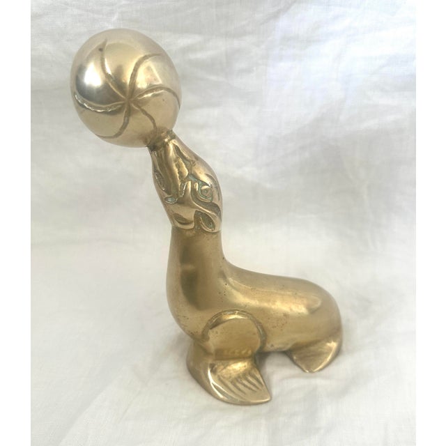 Vintage Solid Brass Seal Figurine w/Balancing Ball on nose. Perfect as a paperweight or by itself on a bookcase. 8.25in h...