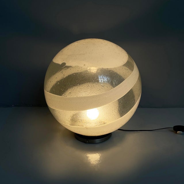 Italian modern Murano opaline glass table lamp, 1970s Table lamp with a spherical Murano glass and opaline glass diffuser....