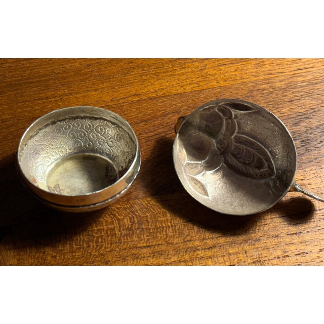 Mid 20th century Cambodian betel nut box crafted in solid .900 silver, marked “90%” on the underside, and formed as a...