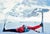 Ski Mirror by Toni Frissell Two skiers lie back to back at the top of a mountain in Zermatt, Switzerland, 1961. (Photo by...