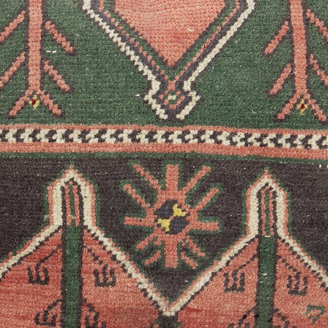 Add a touch of history and warmth to your space with this vintage handmade Turkish wool rug cushion cover. Crafted from...