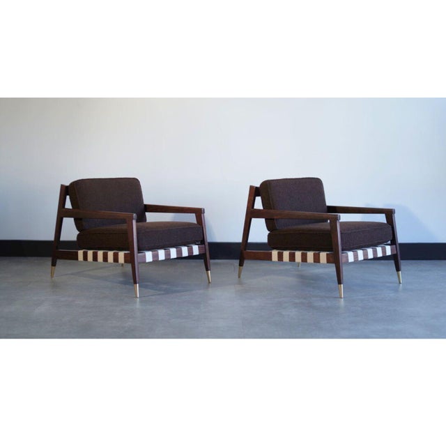 A stunning pair of lounge chairs by Edmond J. Spence for Urban-Aire Group, c. 1950s, meticulously restored by Stamford...