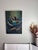 Contemporary Calm in the Chaos by Terra Novak | Oil on wood Woman in blue with otters in a serene setting For Sale - Image 3 of 5