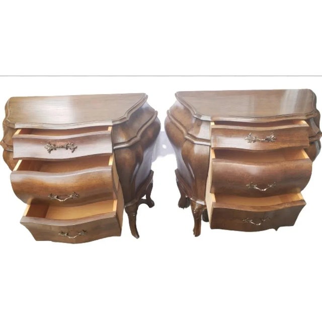 Pair of hand carved walnut Italian bombe chests nightstands with drawers. The Rococo cast brass handles are original. Can...