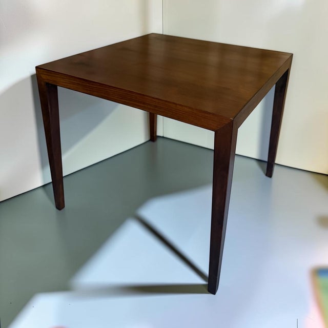 An elegant square side table designed by Severin Hansen Jr. for Haslev Møbelfabrik, Denmark, dating from the 1960s....