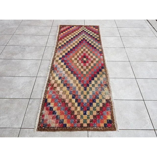 A Turkish handmade vintage Anatolian Oushak rug. We collect old vintage antique rugs from Anatolia, which is the eastern...