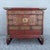 This vintage Chinese Tansu-style cabinet showcases the timeless craftsmanship of traditional Asian furniture with a richly...