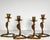 Collection of Four Brass Cobra Candlesticks for your consideration. The larger two measure approx. 6 5/8 inches tall and...
