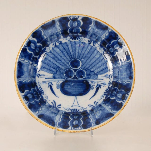 Antique Dutch Delft cabinet plate Material: Delft pottery, earthenware tin glazed Maker: The 3 Bells factory (1670- 1841),...