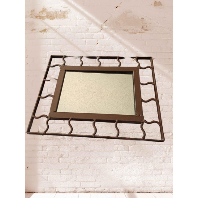 Elevate your space with this stunning heavyweight wrought iron mirror, that perfectly captures the Spanish Revival feel....