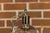 An English nickel and glass bell light fixture from the Midcentury period, with cluster of three arms. Discover the...