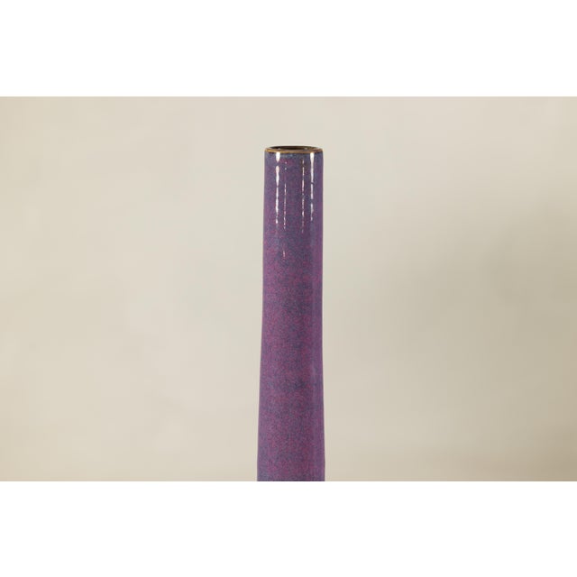 "About the Item This tall ceramic vase presents a refined and sculptural silhouette, defined by its elongated, cylindrical...