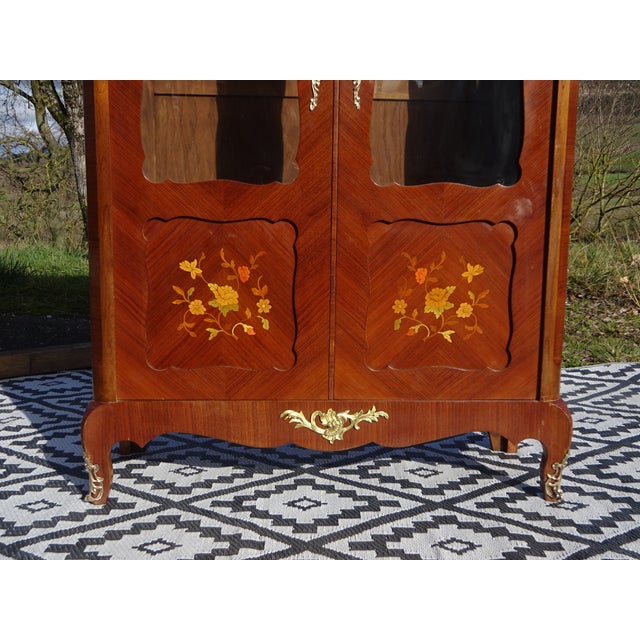 Antique Louis XV style display cabinet with decorative bronze mounts and a marble top. Medium-sized, shallow bookcase-...