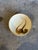 This stunning stoneware large serving bowl features a beautiful interior hand-painted design depicting stylized bird...