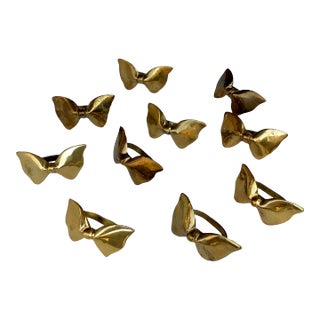 Vintage Set of 10 Brass Bow Tie Napkin Rings For Sale