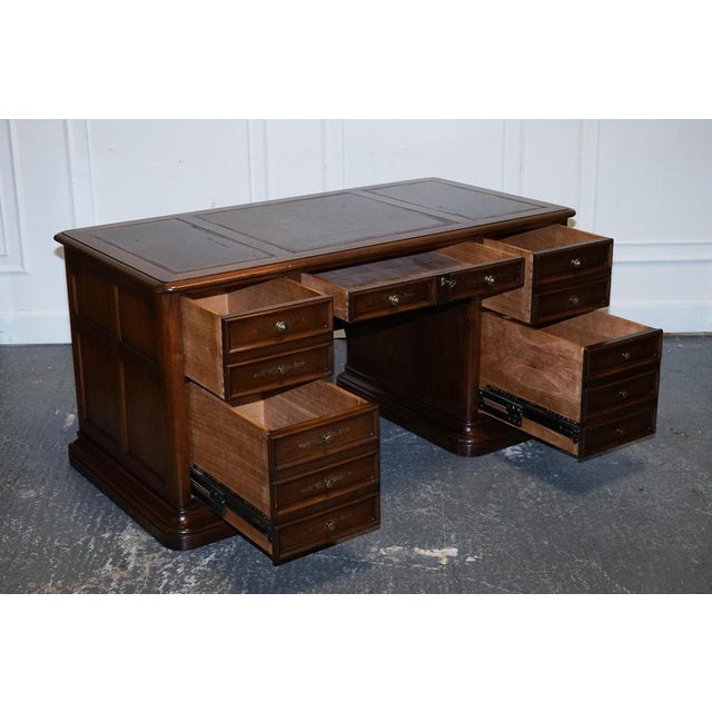 Vintage Hekman USA Twin Pedestal Desk with Brown Leather. A stunning desk, the pedestals do not come apart so it is very...