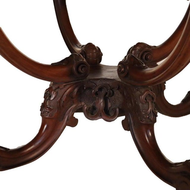 Antique Rococo Carved Mahogany Turtle Top Center Table C1890 Measures - 53 1/2" x 39 1/4" x 25 3/4" An example of Rococo...