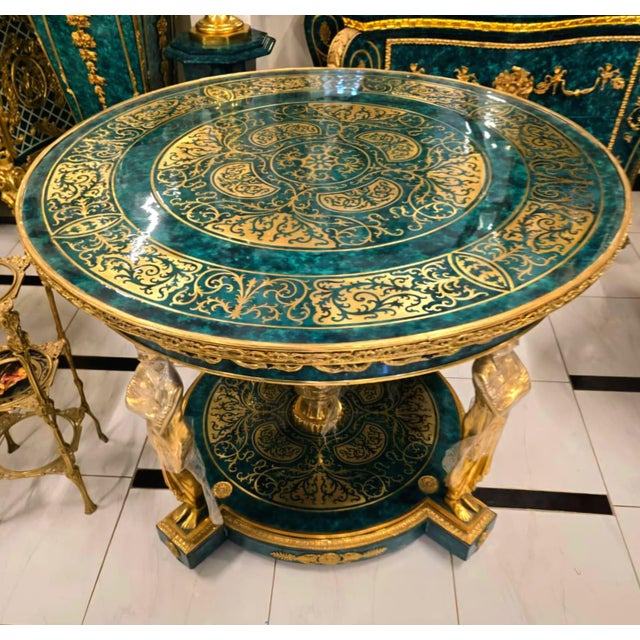 Bring timeless European grandeur into your home with this Monumental French Empire Center Table, exquisitely finished in a...