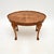 A good looking and very well made antique figured walnut pie crust coffee table. This was made in England, it dates from...