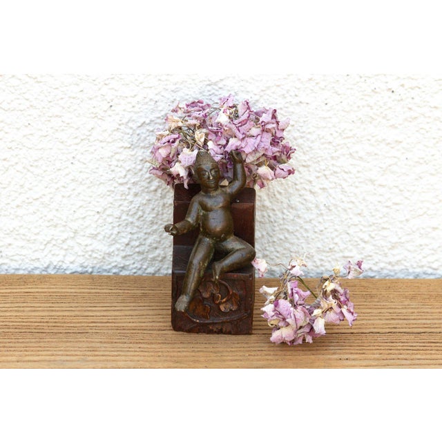 Hand-cast via ancestral lost-wax casting methods, this enchanting micro-sculpture represents a highly beloved narrative in...