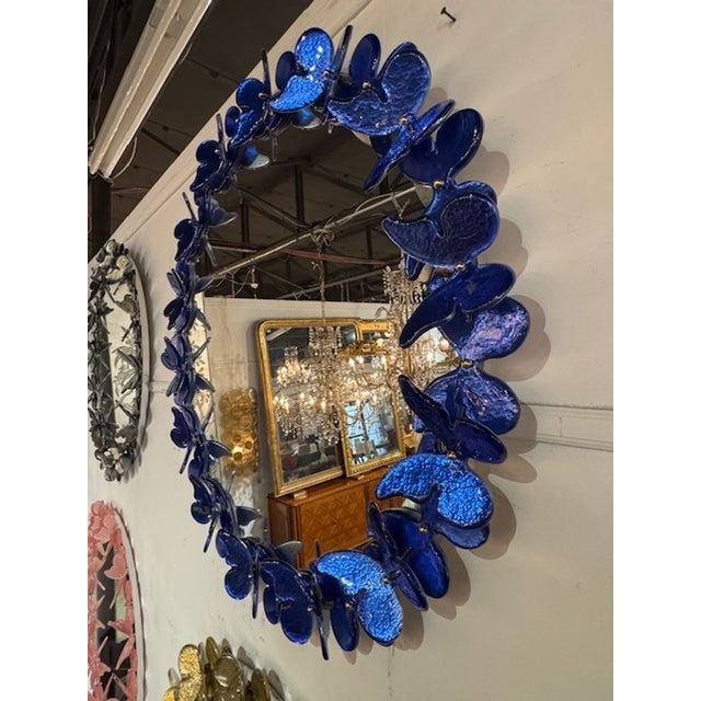Gorgeous modern Italian Murano glass butterfly mirror in cobalt blue. Perfect for today's modern designs. 39" diameter