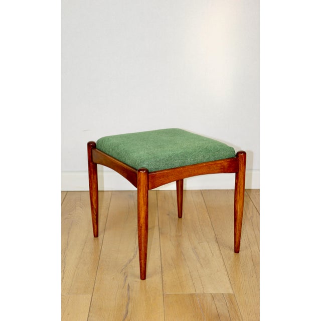 Edmund Homa stool with a green seat made of structural fabric. This stool, designed by Edmund Homa and manufactured in the...