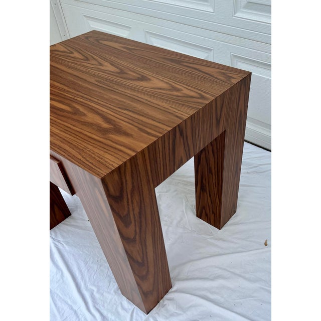 Rosewood-like laminate parson style desk, side table or nightstand with a drawer. In the style of Milo Baughman, featuring...