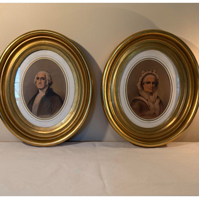 Elevate your space with this stunning pair of antique oval portrait prints depicting George and Martha Washington....