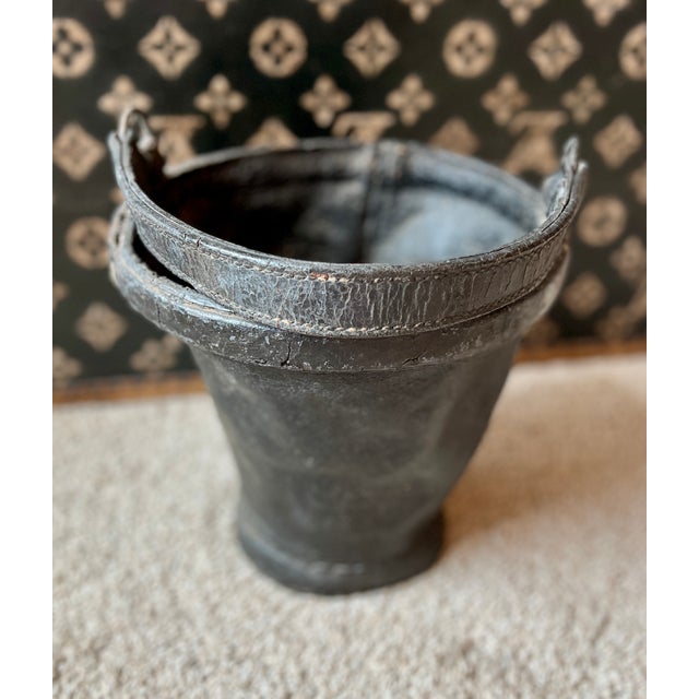 Antique English Black Leather Fire Bucket Some lovely wear and restitching/repair, all antique. 10 inches tall x 10 inches...