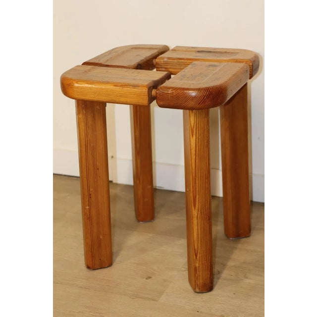 Solid pine stool designed by Olof Ottelin. Scandinavian design from the 1960s, with clean lines and rounded corners...