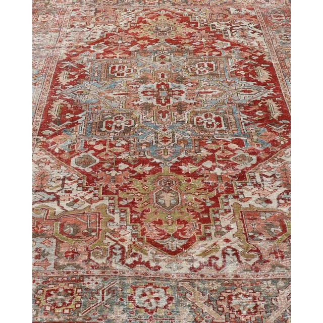 Early 20th Century Antique Persian Heriz Rug With Geometric Medallion Design in Red & Soft Colors For Sale - Image 4 of 12