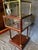 Antique mahogany and brass pop-up metamorphic bar and cigar table. All original finish and glass, including racks for 3...