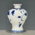 This is an elegant vintage Chinese blue and white porcelain vase , decorated in the classic qinghua palette. The vase...