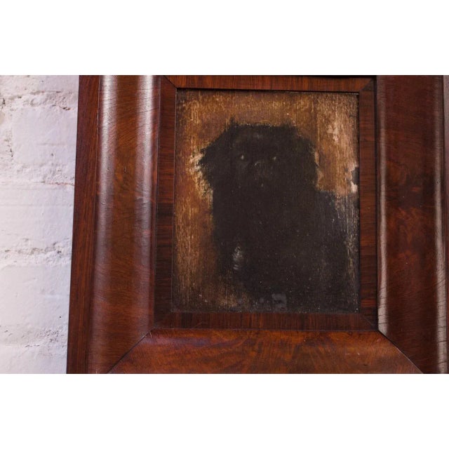 Attractive oil on canvas depicting an English toy spaniel, circa 1930s. Original frame is a handsome walnut burl. Light...