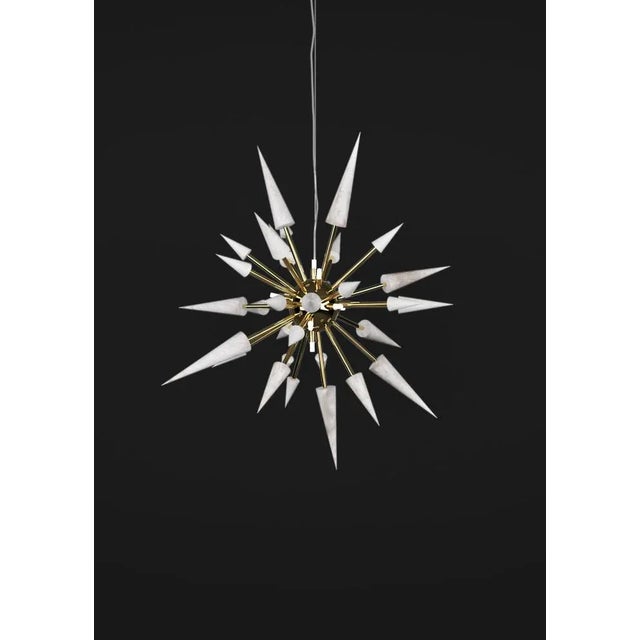 Perseo 100 shiny gold metal pendant lamp by alabastro italiano dimensions: ø 100 x h 300 cm. Materials: white alabaster...