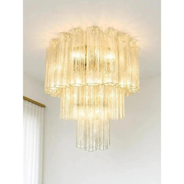 Scenographic italian hand-made flush mount with clear “tronchi”in old-crystal color , elements of murano glass. elegant...