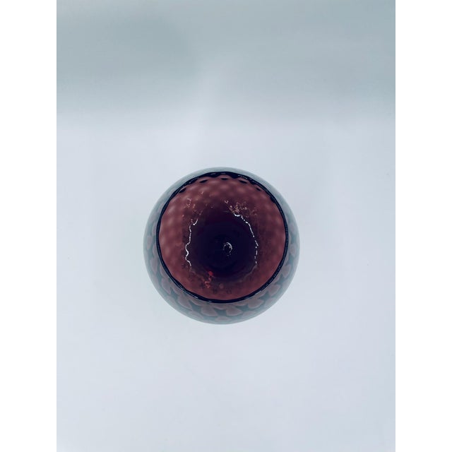 A chalice, an Empoli-style vase, Italian, from the 1960s/1970s, made of high-quality art glass. The chalice features a...
