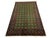 Rows of small octagonal Mori Gul motifs and red geometric flowers repeat across the rich green field of this wool rug....